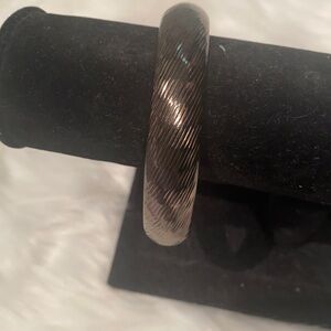 Women’s like new bronze bangle with security latch